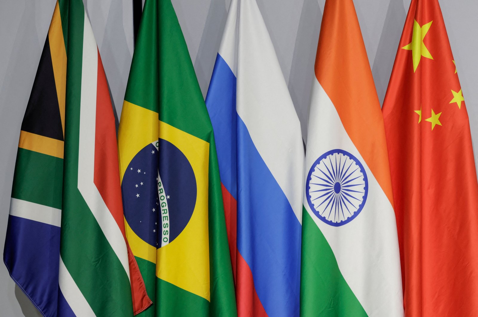 A general view of flags of (From L to R) South Africa, Brazil, Russia, India and China during the 2023 BRICS Summit at the Sandton Convention Centre in Johannesburg on August 24, 2023. (AFP Photo)