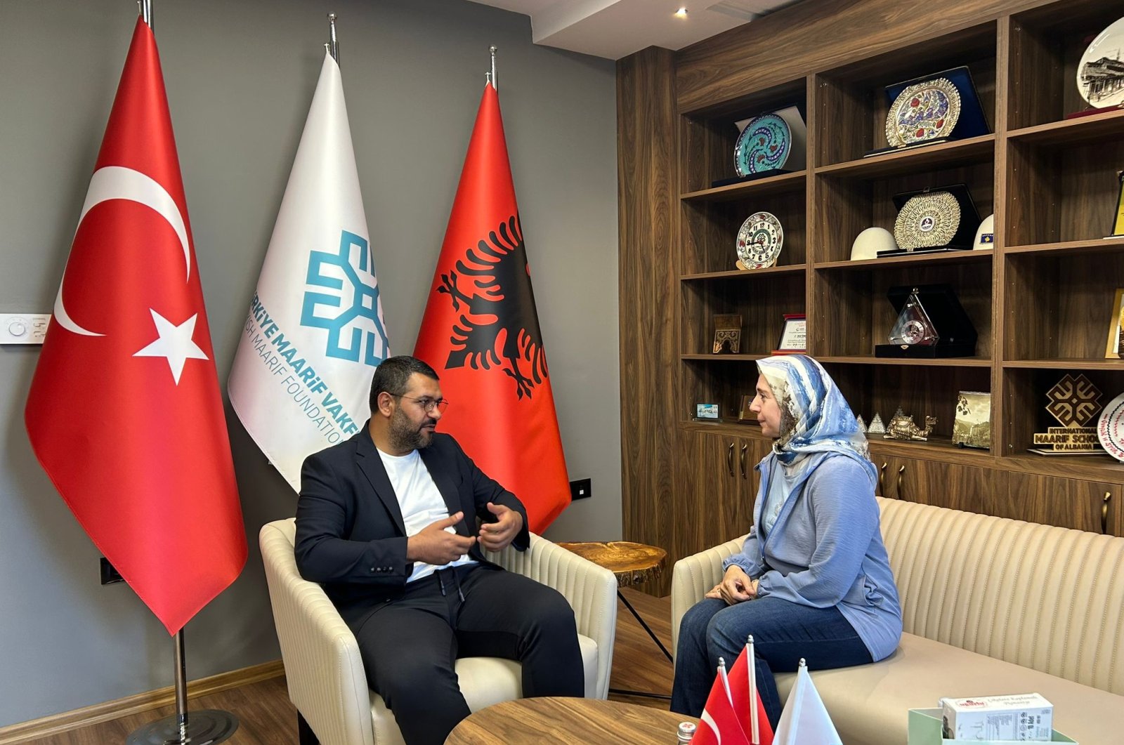 Mesut Özbaysar, director of the Turkish Maarif Foundation, with Daily Sabah corespondent Esma Kamil in Tirana, Albania, Aug. 15, 2023. (Photo by Esma Kamil)