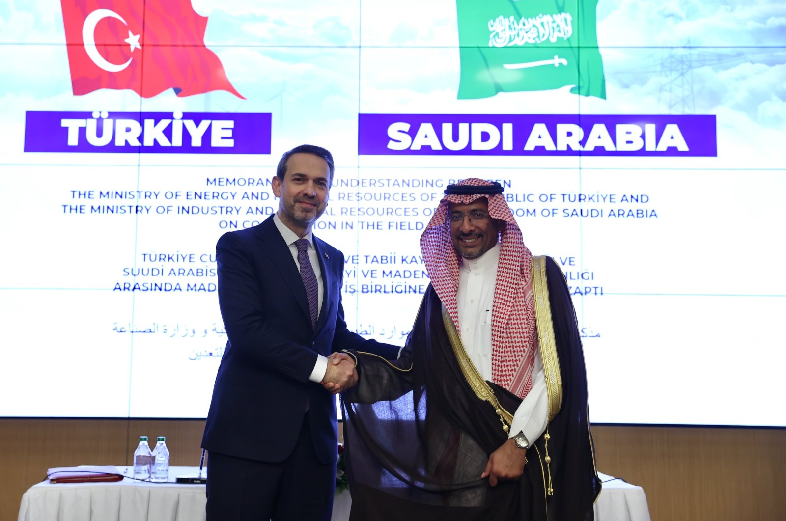 Energy and Natural Resources Minister Alparslan Bayraktar (L) shakes hands with Saudi Arabia’s Industry and Mineral Resources Minister Bandar Alkhorayef during the memorandum of understanding signing ceremony, Ankara, Türkiye, Aug. 28, 2023. (DHA Photo)