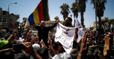 People protest against the Syrian government in Sweida, Syria, Aug. 24, 2023. (Reuters Photo)