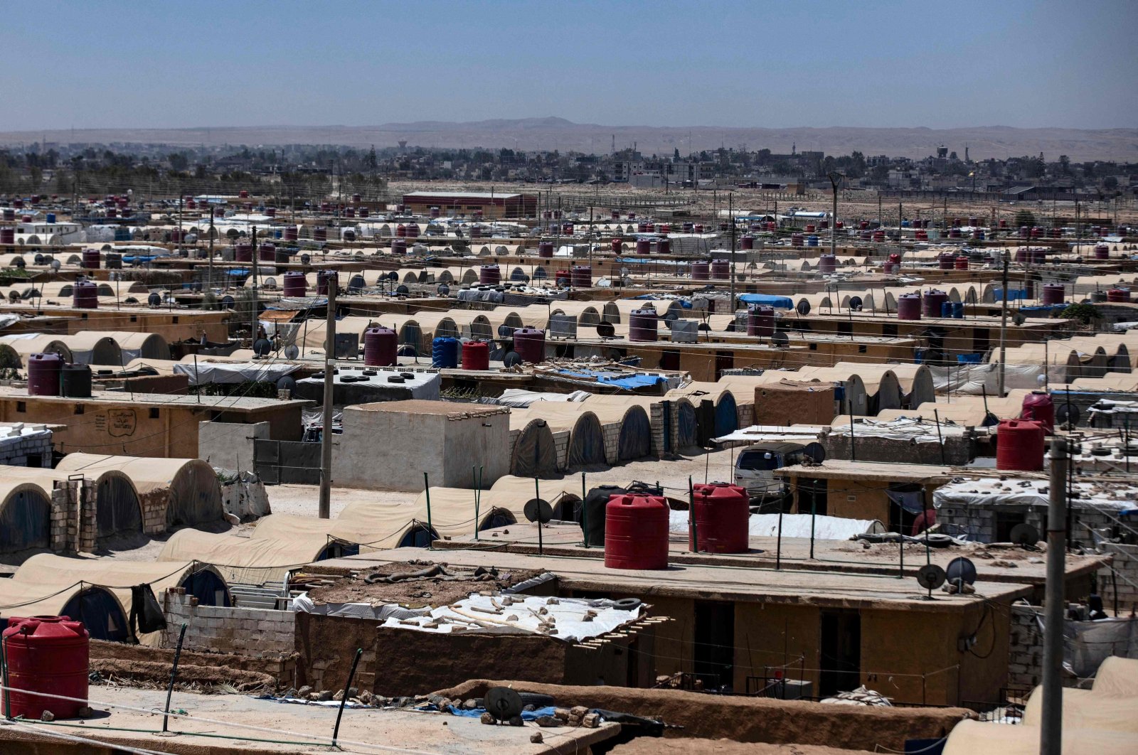 A view of the al-Talaeh makeshift camp where thousands of people displaced by 12 years of war are languishing in extreme poverty, largely cut off from international assistance, in Syria&#039;s northeastern Hasakeh province, on July 13, 2023. (AFP Photo)