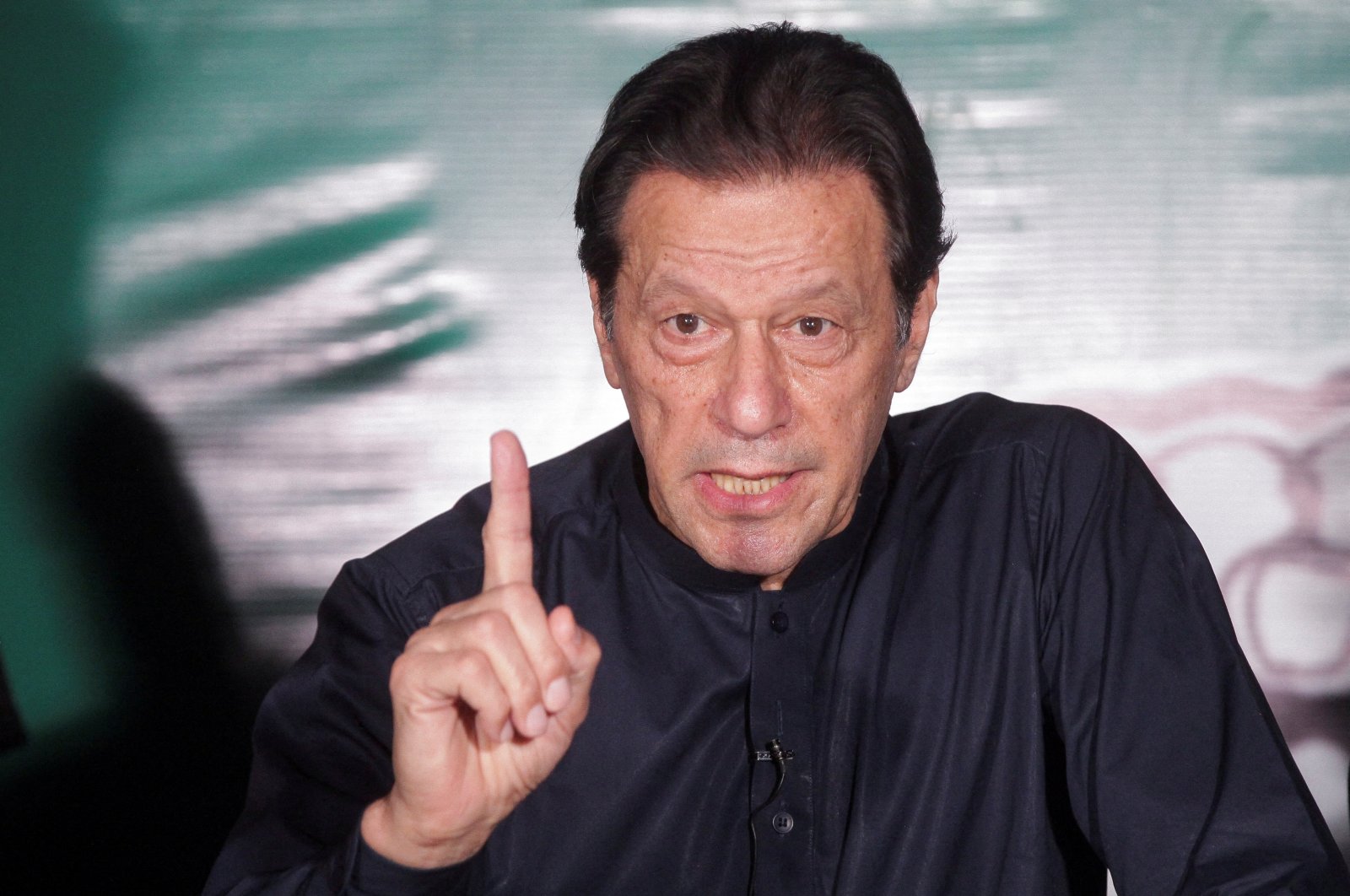 Pakistan&#039;s former PM Imran Khan speaks in Lahore, Pakistan, May 18, 2023. (Reuters Photo)