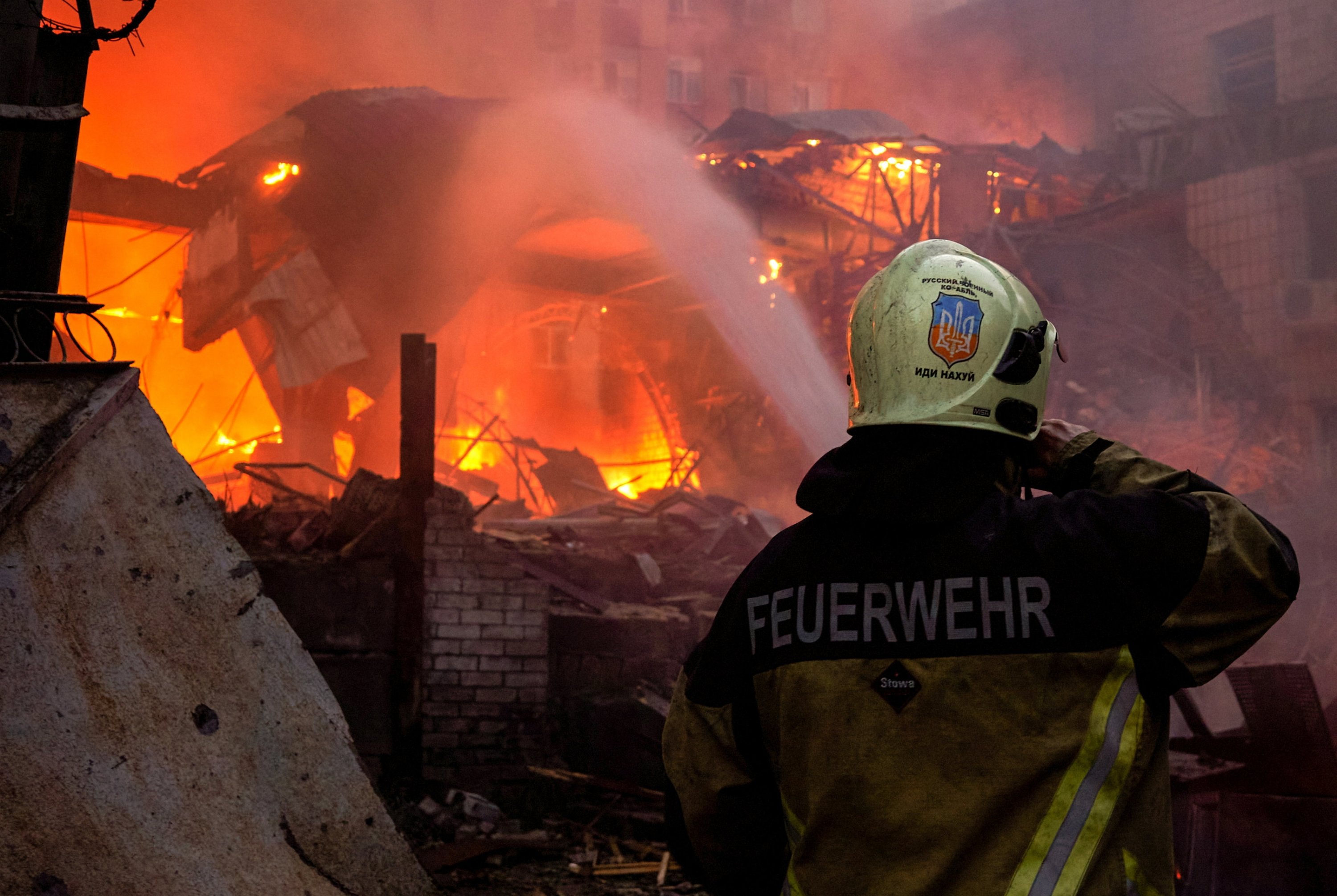 A firefighter works at the site of a missile strike in Kyiv, Ukraine, Aug. 30, 2023. (EPA Photo)