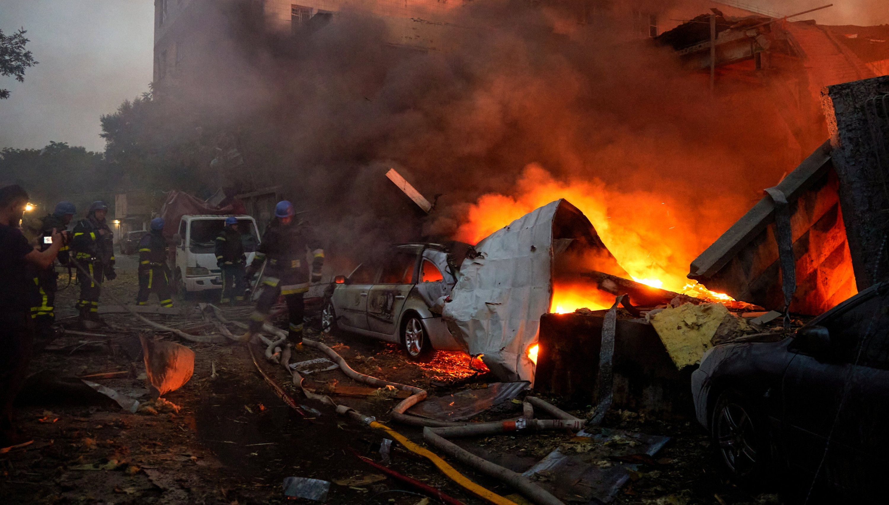 Firefighters work at the site of a missile strike in Kyiv, Ukraine, Aug. 30, 2023. (EPA Photo)