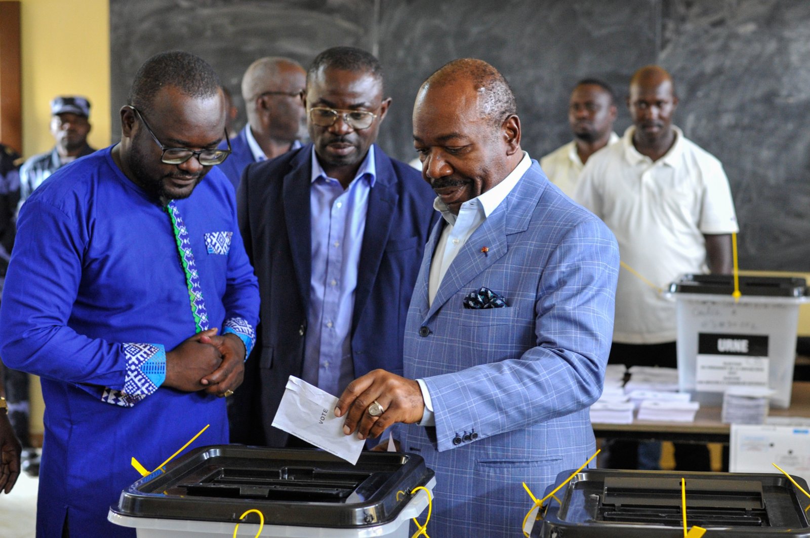 Gabonese President Ali Bongo Ondimba (R), casts his vote during the 2023 Gabonese general elections in Libreville, Gabon, Aug. 26, 2023. (EPA Photo)