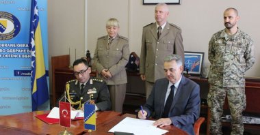 Bosnia's Deputy Defense Minister Zoran Sajinovic and Turkish Embassy Military Attaché Col. Mustafa Sıtkı Tatar sign agreement plan in Sarajevo, Bosnia-Herzegovina, Aug. 31, 2023. (AA Photo)