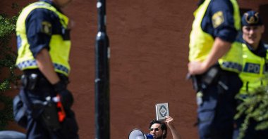 Salwan Momika prepares to desecrate the Muslim holy book Quran, outside a mosque in Stockholm, Sweden, June 28, 2023. (AFP File Photo)