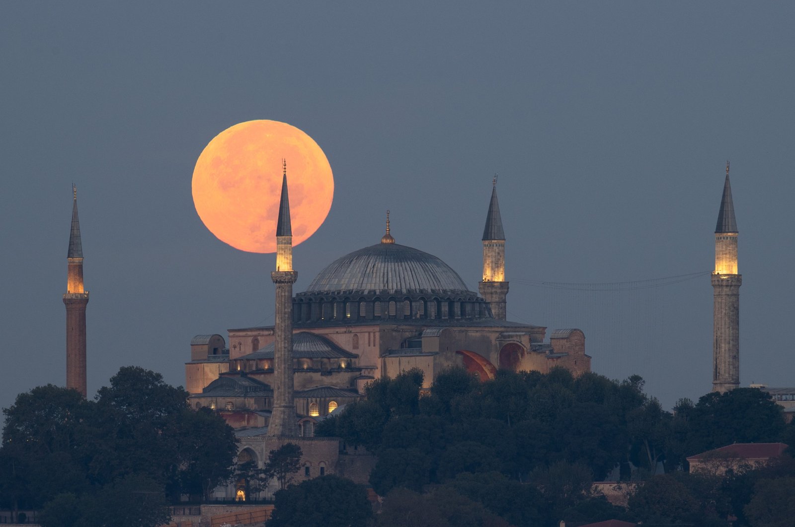 The blue supermoon rises above the historic Hagia Sophia Grand Mosque in Istanbul, Türkiye, Aug. 31, 2023. (AA Photo)