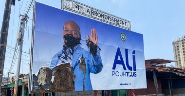 A general view of a defaced campaign billboard of ousted Gabon President Ali Bongo Ondimba, Libreville, Gabon, Aug. 31, 2023. (AFP Photo)