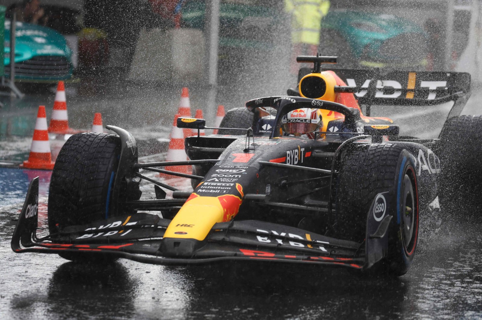 Red Bull Racing&#039;s Dutch driver Max Verstappen drives to the pit under the rain as the race is stopped during the Dutch Formula One Grand Prix race at The Circuit Zandvoort, Zandvoort, Netherlands, Aug. 27, 2023. (AFP Photo)