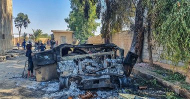 Debris of a charred vehicle after clashes in Deir el-Zour, Syria, Sept. 2, 2023. (İHA Photo)
