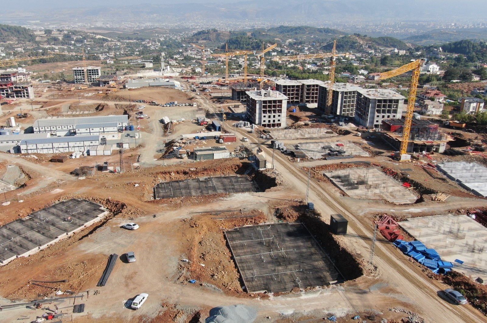 The aerial view of ongoing construction of new housing units in earthquake-stricken province of Hatay, southeastern Türkiye, Aug. 31, 2023. (IHA Photo)