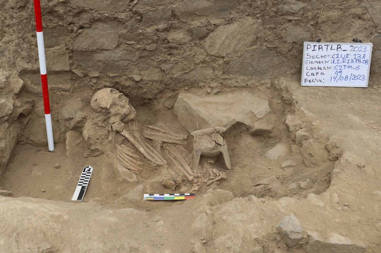 A pre-Hispanic archaeological site dedicated to ancestor worship, discovered with underground burial chambers and human remains with ceramic offerings, Lima, Peru, Sept. 2, 2023. (AFP Photo)