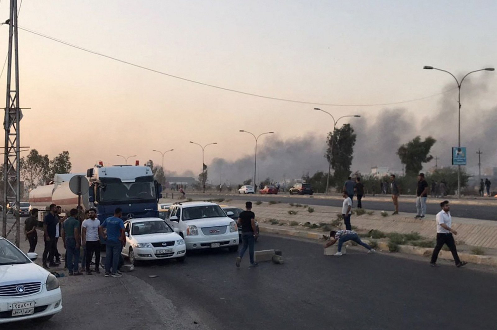 Iraqi protesters block a road following protests in Kirkuk, Iraq, Sept. 2, 2023. (AFP Photo)