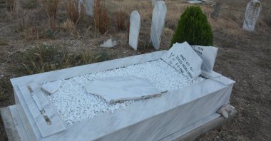 The tombstone of a Turkish person lies wrecked after a group of unidentified people attacked a Turkish minority cemetery in the Western Thracian village of Polianthos (Narlıköy), Greece, Sept. 3, 2023. (AA Photo)