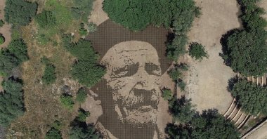 The portrait of Turkish folk poet Aşık Veysel is made of 25,000 handfuls of earth, Bodrum, Muğla, Türkiye, Sept. 3, 2023. (Photo courtesy of Gümüşlük Sia Familia)