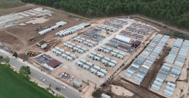 An aerial view of the container city for earthquake survivors in Kırıkhan, Hatay, Türkiye, Sept. 4, 2023. (IHA Photo)