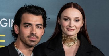 Joe Jonas and Sophie Turner wearing a dress by Louis Vuitton attend &quot;The Staircase&quot; TV show premiere at MoMA, New York, U.S., May 3, 2022. (Shutterstock Photo)
