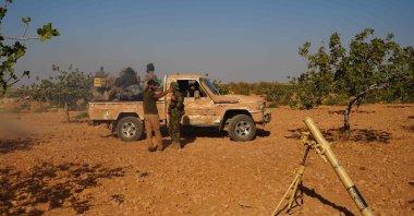 Fighters are positioned on the Mahsali and Arab Hasan front line as they fight with the PKK/YPG, on the outskirts of Manbij, northeastern Syria, Sept. 4, 2023. (AFP Photo)