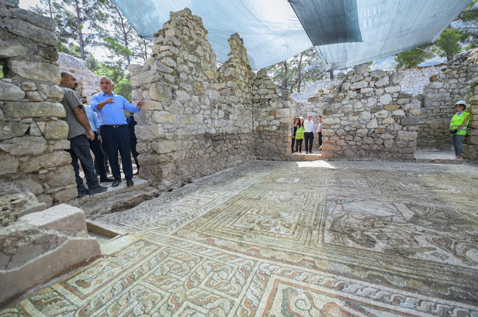 Culture and Tourism Minister Mehmet Nuri Ersoy visits the ancient city of Olympus, Antalya, southern Türkiye, Sept. 3, 2023. (DHA Photo)