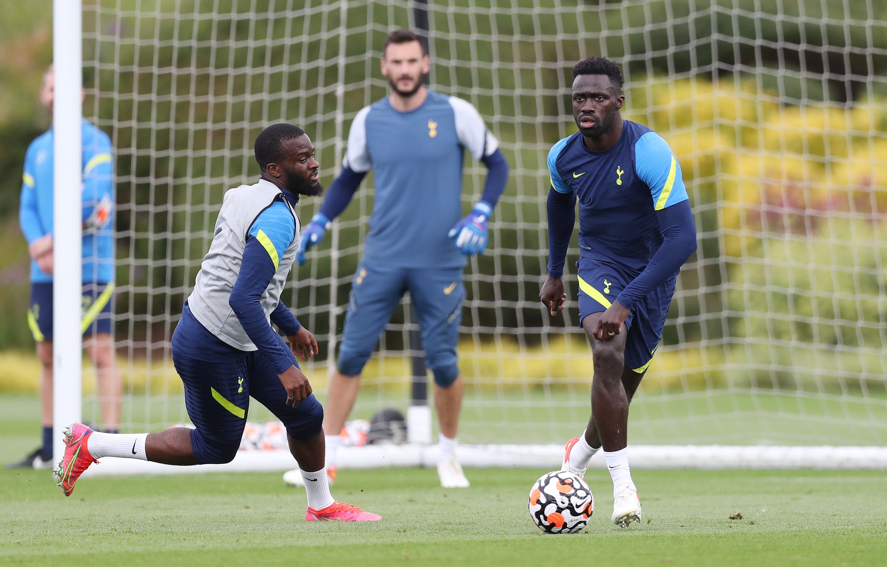 Tottenham Hotspur's Davinson Sanchez (R) and Tanguy Ndombele during a training session at Tottenham Hotspur Training Centre, Enfield, U.K., Aug. 27, 2021. (Getty Images Photo)