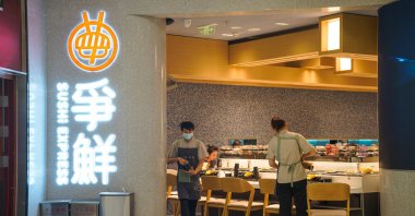 The staff work in a Japanese sushi restaurant in Beijing, China, Aug. 28, 2023. (EPA Photo)