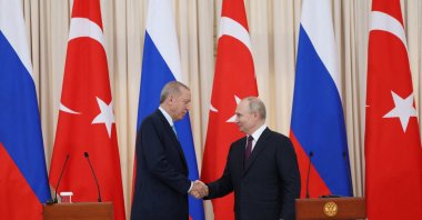 President Recep Tayyip Erdoğan (L) shakes hands with his Russian counterpart Vladimir Putin during a press conference in Sochi, Russia, Sept. 4, 2023. (Reuters Photo)