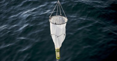 Scientists drop a device to measure the oxygen level in the Marmara Sea, Istanbul, Türkiye, Sept. 5, 2023. (AA Photo)