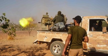 Fighters are positioned on the Mahsali and Arab Hasan front line as they fight the PKK/YPG, Manbij, Syria, Sept. 4, 2023. (AFP Photo)