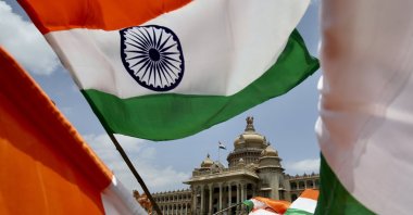 An Indian national flag is seen in front of the State Legislature of Karnataka, in Bangalore, India, Aug. 15, 2023. (EPA Photo)