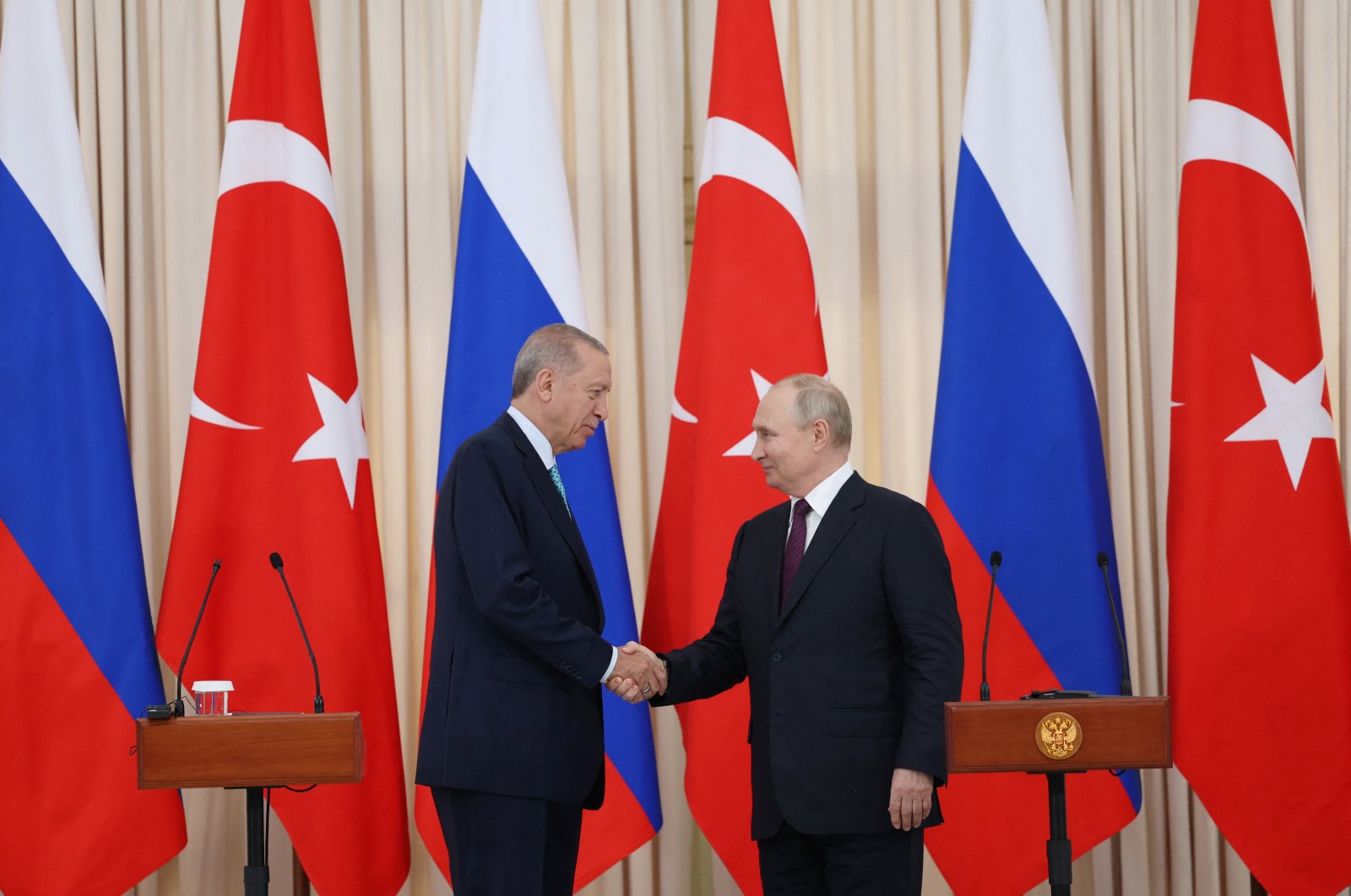 President Recep Tayyip Erdoğan (L) shakes hands with his Russian counterpart Vladimir Putin during a press conference in Sochi, Russia, Sept. 4, 2023. (Reuters Photo)