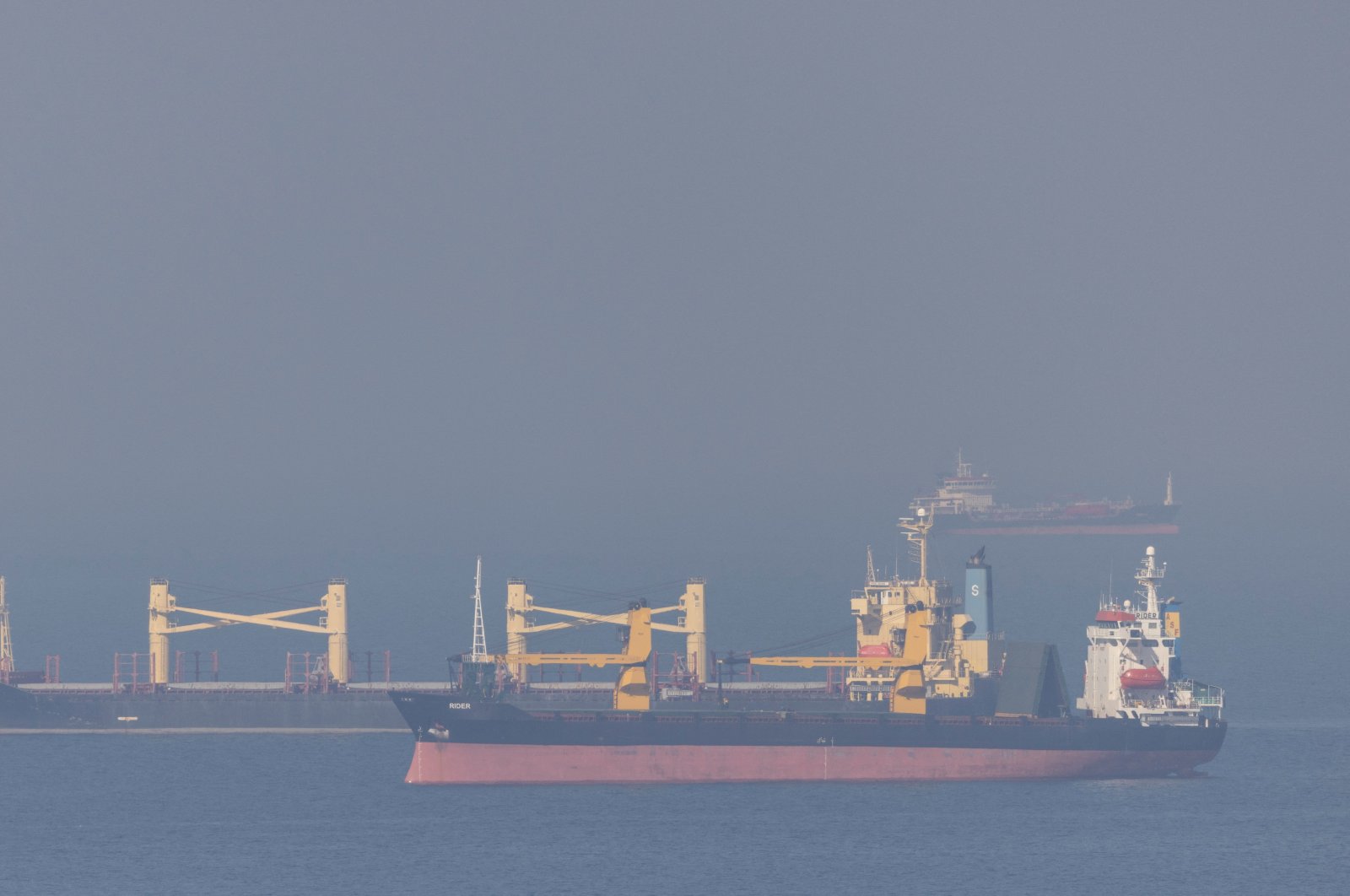 The cargo ship Super Bayern, carrying Ukrainian grain, is seen behind the cargo ship Rider in the Black Sea off Kilyos near Istanbul, Türkiye, Nov. 2, 2022. (Reuters Photo)