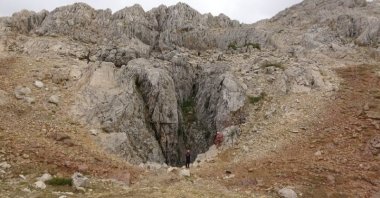 The entrance of Morca Cave at an altitude of 2,100 meters in the Anamur district of Mersin, Türkiye, Sept. 06, 2023. (IHA Photo)