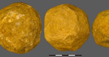 This handout image shows three limestone spheroids from the 'Ubeidiya Stone Age archaeological site in Israel, Sept. 6, 2023. (AFP Photo)