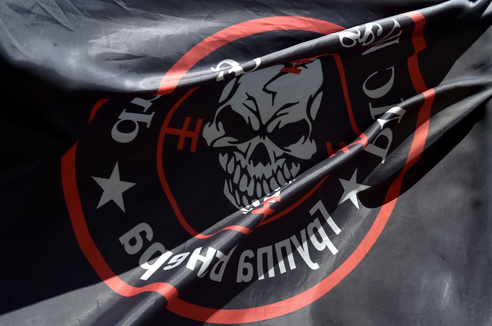A flag bearing the logo of the private mercenary group Wagner is seen in Novosibirsk, southern Russia, August 24, 2023. (AFP Photo)