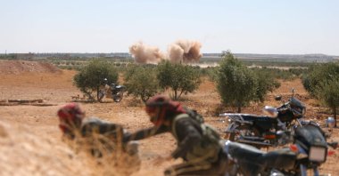 Arab fighters are positioned on the Buwayhij-Boughaz-Korhoyuk front line on the outskirts of Manbij as they fight with the PKK/YPG, in northeastern Syria, Sept. 6, 2023. (AFP Photo)