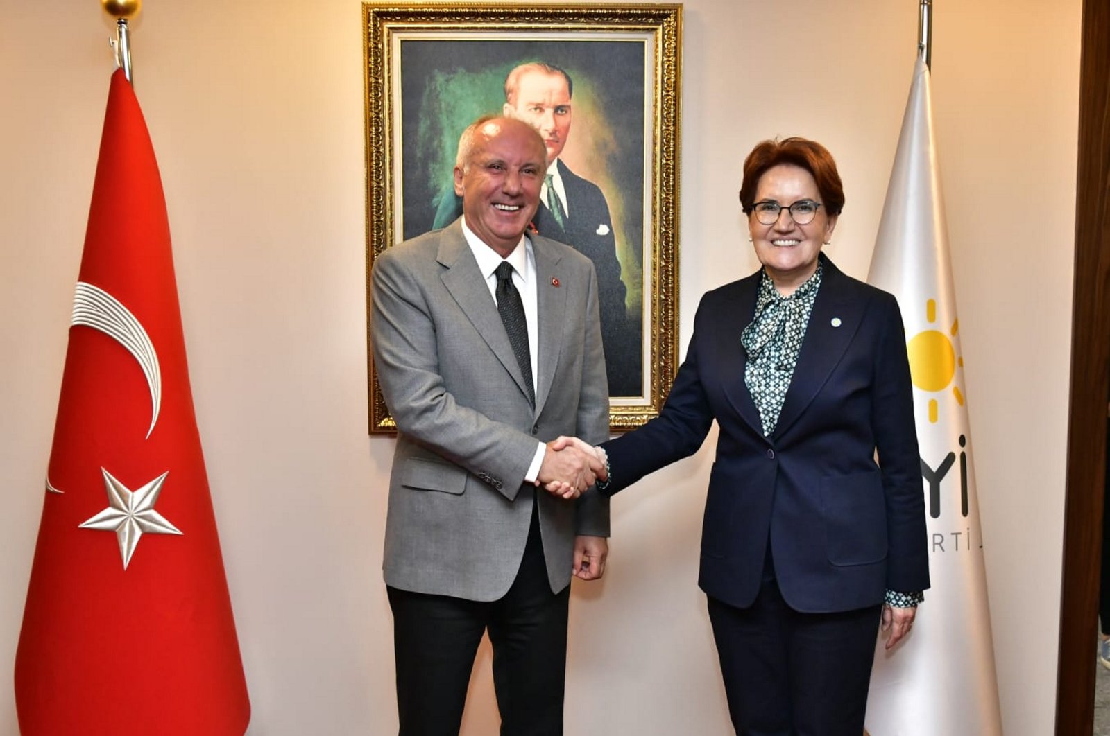 Homeland Party (MP) Chair Muharrem Ince (L) shakes hands with Good Party (IP) Chair Meral Akşener before their meeting, in the capital Ankara, Türkiye, Sept. 6, 2023. (AA Photo)