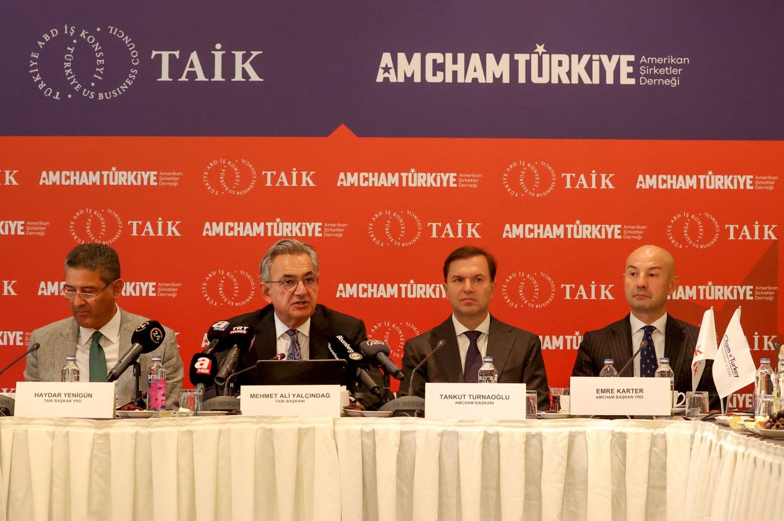 Türkiye-U.S. Business Council (TAIK) Chairperson Mehmet Ali Yalçındağ (2L), AmCham of Türkiye President Tankut Turnaoğlu (2R) during the news conference, Istanbul, Türkiye, Sept. 7, 2023. (AA Photo)