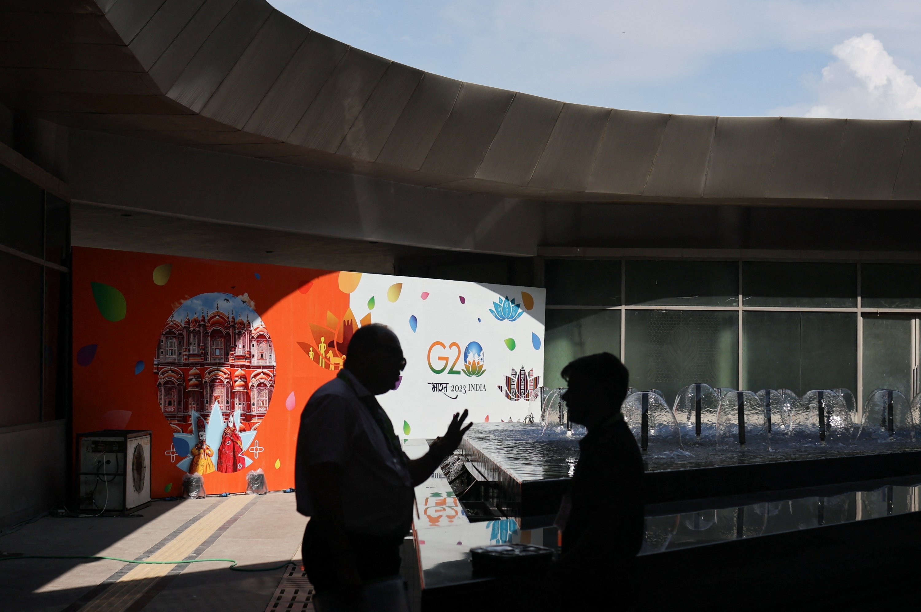 People talk ahead of G20 Summit, at International Media Centre (IMC), in New Delhi, India, September 8, 2023. REUTERS/Anushree Fadnavis