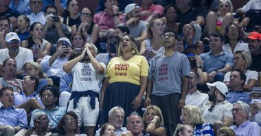 Climate protesters delay the semifinal match between USA's Coco Gauff and Czechia's Karolina Muchova at the US Open Tennis Championships at the USTA National Tennis Center in Flushing Meadows, New York, US., Sept. 7, 2023. (EPA Photo)
