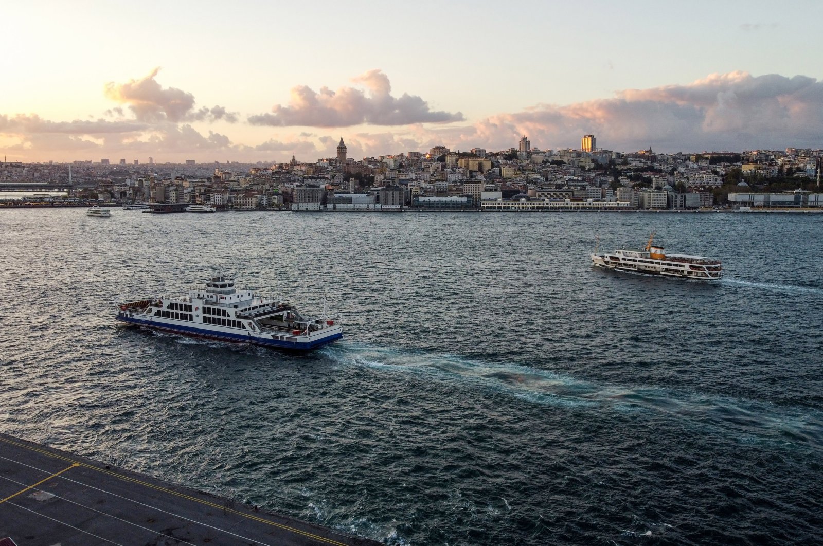 Passenger ferries sail along the Bosporus strait in Istanbul, Türkiye, Oct. 4, 2021. (Getty Images Photo)