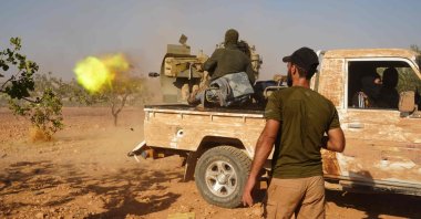 Arab fighters are positioned on the Mahsali and Arab Hasan front line on the outskirts of Manbij to fight against the PKK/YPG, northeastern Syria, Sept. 4, 2023. (AFP Photo)