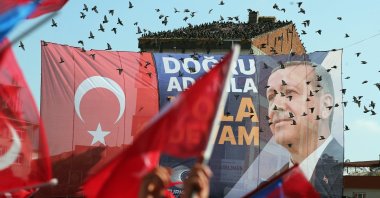 An election banner is seen as supporters of President Recep Tayyip Erdoğan gather for his election campaign rally prior to the second round of presidential elections in Istanbul, Türkiye, May 26, 2023. (EPA Photo)