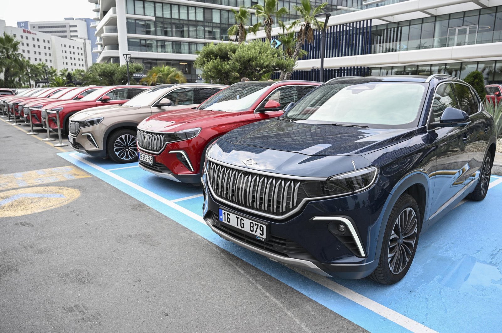 T10Xs, fully electric SUV models of Türkiye&#039;s first domestic car brand, Togg, parked near a showroom in Istanbul, Türkiye, Aug. 16, 2023. (AA Photo)
