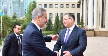 Kazakh Foreign Minister Nurtleu (R) welcomes Foreign Minister Hakan Fidan, Astana, Kazakhstan, Sept. 11, 2023. (İHA Photo)