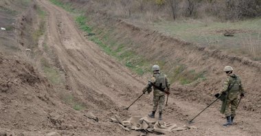 Azerbaijan military sappers clear mines in the countryside outside the town of Fuzuli, Azerbaijan, Nov. 26, 2020. (AFP File Photo)