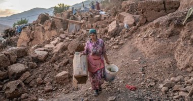 A woman walks in her village in the mountainous area of Tizi N&#039;Test, in the Taroudant province, Morocco, Sept. 11, 2023. (AFP Photo)