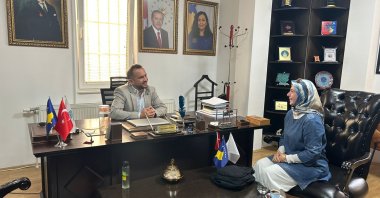 Oğuz Hamza Yılmaz, director of the Turkish Maarif Foundation, with Daily Sabah corespondent Esma Kamil in Pristina, Kosovo, Aug. 15, 2023. (Photo by Esma Kamil)