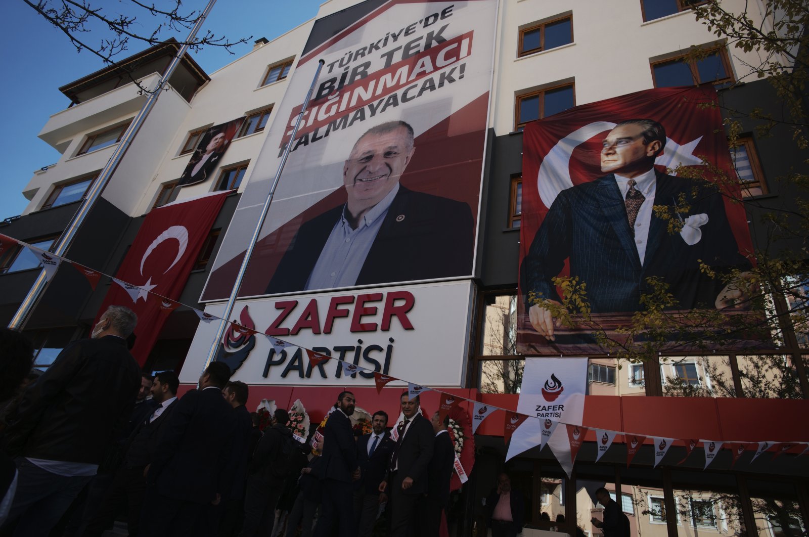A banner reading &quot;Not a single asylum-seeker will remain in Türkiye!&quot; displayed at the headquarters of the anti-refugee Victory Party, above the photo of party&#039;s chair Ümit Özdağ, in the capital Ankara, Türkiye, November 6, 2021. (AP Photo)