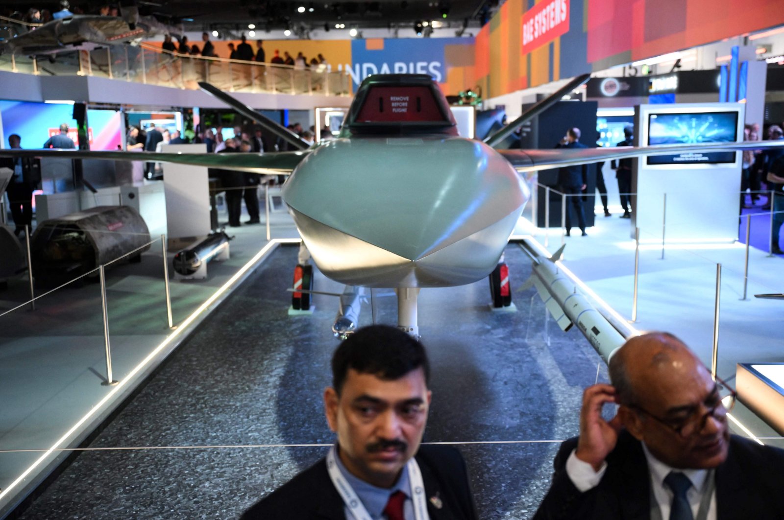 Visitors stand by an intelligent aircraft by Bae Systems during the Defence and Security Equipment International (DSEI) fair at the ExCeL center, London, U.K., Sept. 12, 2023. (AFP Photo)